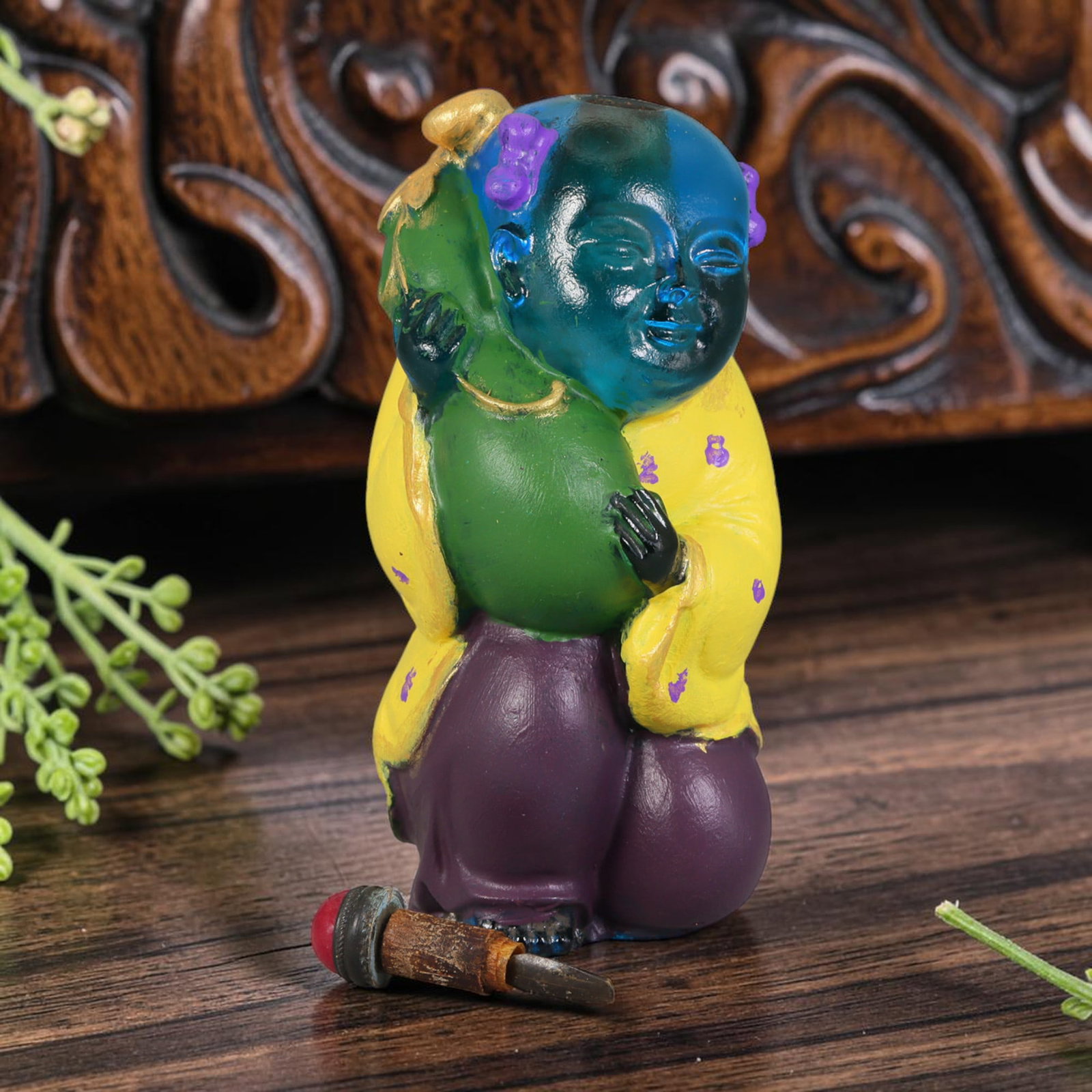 Vintage Chinese Liuli Glass Snuff Bottle - Girl with Melon, 82YF: This snuff bottle is crafted from vibrant liuli glass, featuring a meticulously painted figure of a girl holding a melon. The figure is adorned with intricate floral patterns in purple and yellow, sho