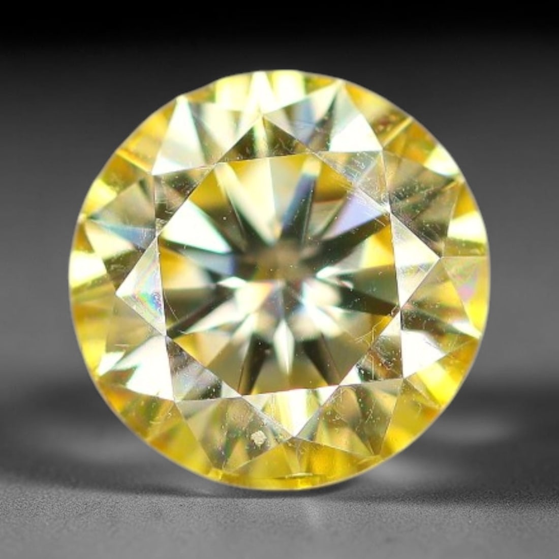 0.95 Carats Yellow Moissanite Loose Gemstone, 45WP: This yellow moissanite features dimensions of 6.5x3.9mm, crafted from high performance silicon carbide material famous for exceptional light refraction and brilliant light dispersion that creates inte
