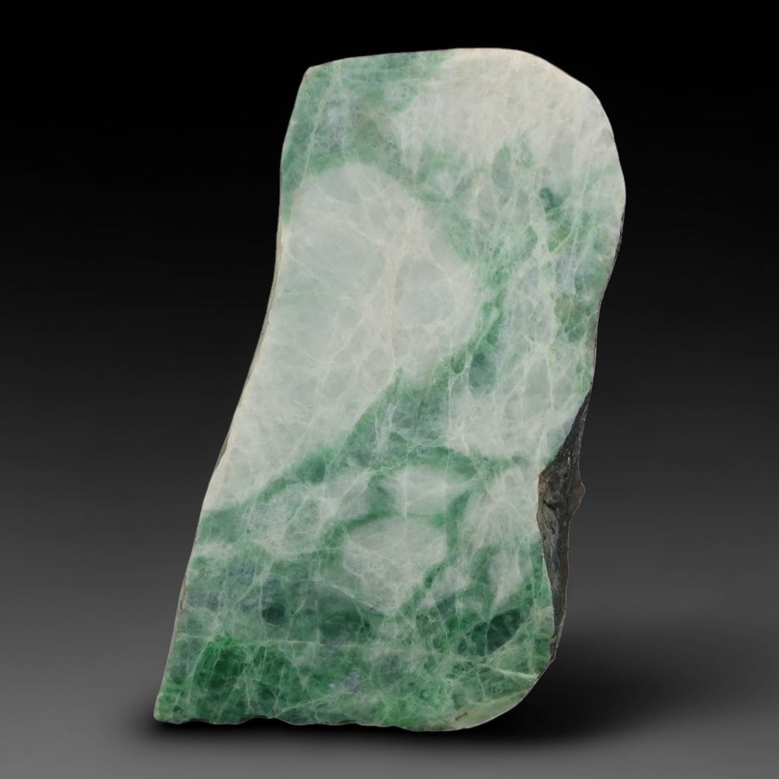 159ct Natural Type A Burmese Jadeite Jade Sliced Rough, 15YN: This specimen is a sliced rough block of natural Type A Burmese jadeite jade. The interior displays natural colour zoning with visible mineral veining and crystalline patterns typical of unprocessed j