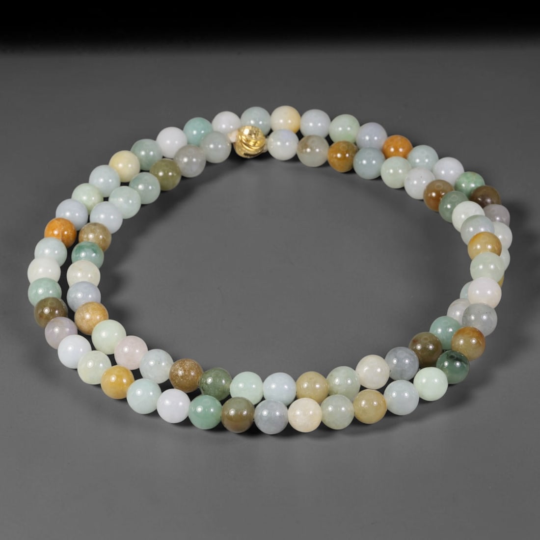 Natural Burmese Type A Soft Multi-Tone Round Jadeite Jade Beaded Necklace, 40TF: Hand-strung bead necklace made of genuine untreated Type A Burmese jadeite round beads with a gentle blend of pale celadon green, milky white, soft lavender, honey and warm earthy amber hues. Finished