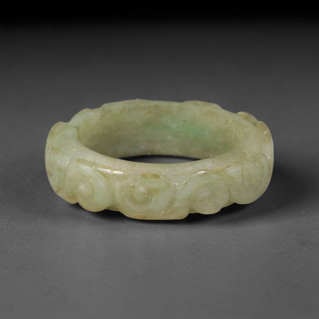 Natural Burmese Type A Jadeite Jade Carving Band Ring Size US 11.5, 17TB: Carved from untreated natural Burmese Type A jadeite jade, this carved stone band holds a soft polished finish showcasing milky pale base hues interspersed with warm natural brown mineral patina patch