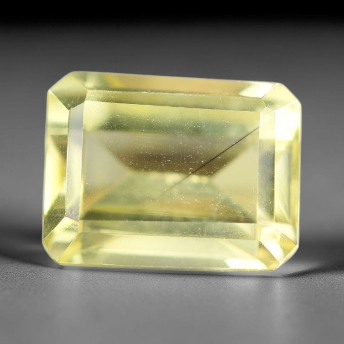 6.65 Carats Natural Brazilian Lemon Quartz Octagon Faceted Loose Gemstone, 4XX: This lemon quartz is sourced from natural mineral deposits within Brazil and refined through standard professional faceted lapidary procedures, accompanied by uniform glossy polishing across the full 
