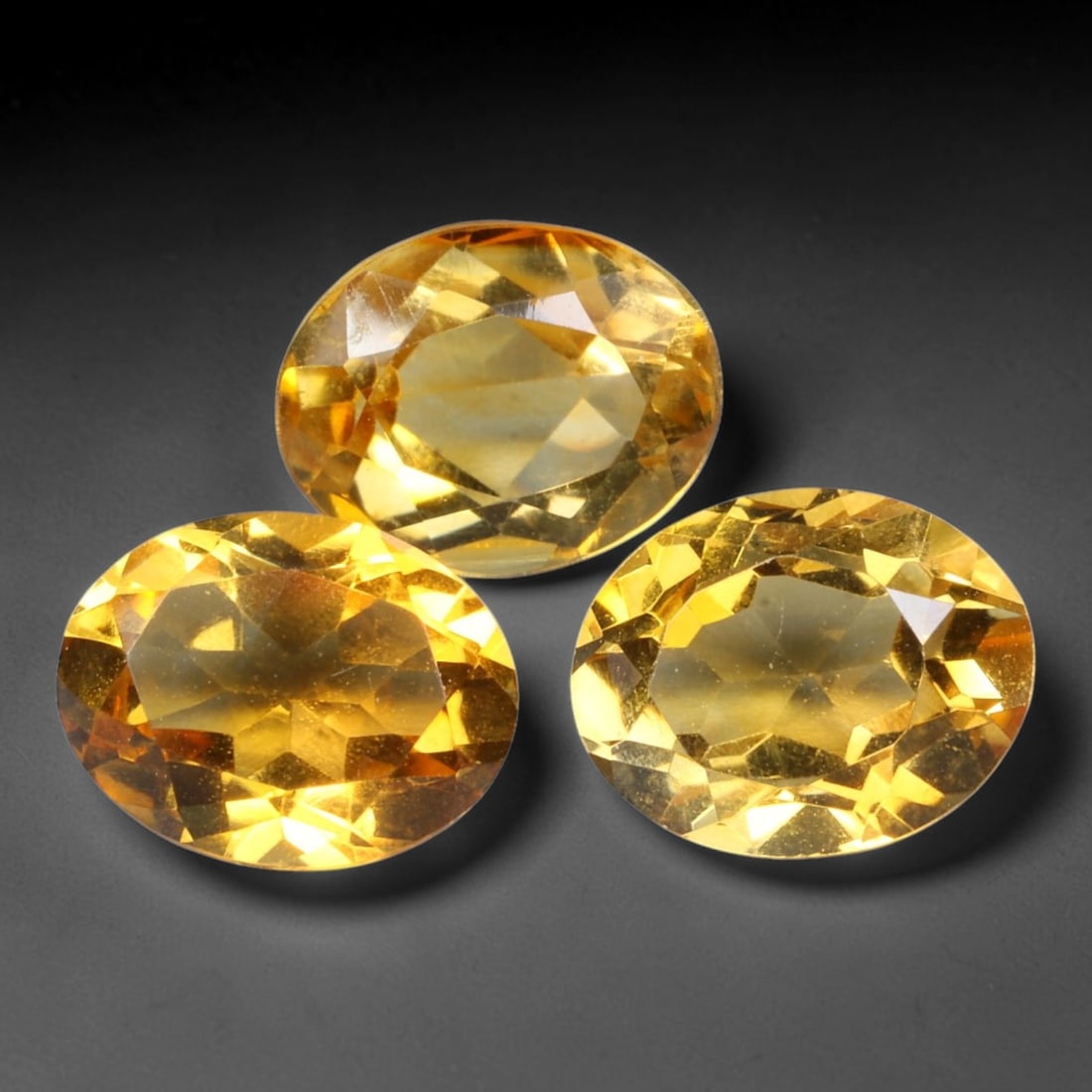 6.09ct Natural Golden Citrine Oval Faceted Parcel Loose Gemstone, 91XX: Matching parcel of hand faceted natural citrine gemstones featuring rich warm golden-yellow tone with subtle inherent mineral characteristics within each stone. Precision faceting and glossy high poli