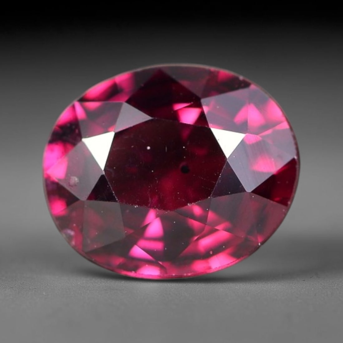 1.90 Carats Natural Pinkish Purple Rhodolite Garnet Oval Faceted Loose Gemstone, 65TS: This garnet material forms within natural geological formations and undergoes precise faceting and high-gloss polishing via professional lapidary techniques. Minor internal pinpoint inclusions and fai