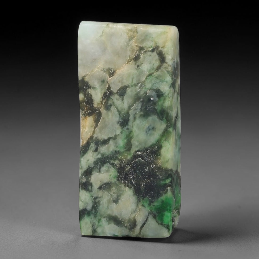 193ct Natural Type A Burmese Jadeite Jade Sliced Rough, 58YK: This specimen is a sliced rough block of natural Type A Burmese jadeite jade. The interior displays natural colour zoning with visible mineral veining and crystalline patterns typical of unprocessed j