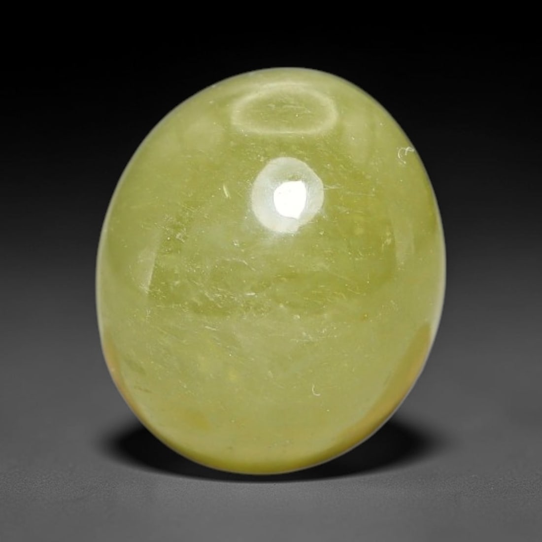 4.96 Carats Natural Madagascar Greenish Yellow Sapphire Cabochon Loose Gemstone, 33XX: Formed from natural corundum sourced from Madagascar geological deposits, this raw mineral material is processed into a polished cabochon form through professional stone finishing techniques with a sm