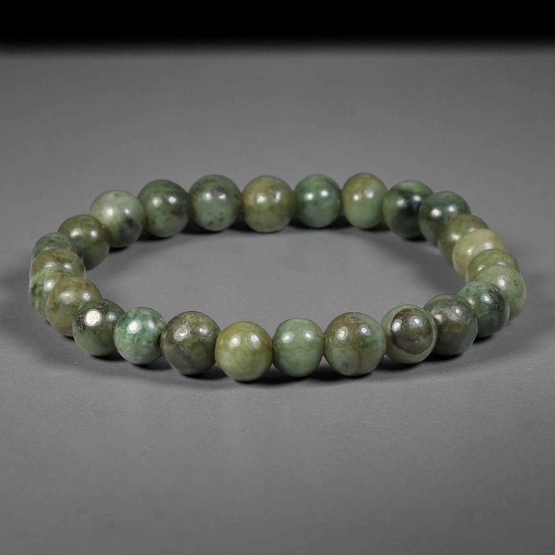 Natural Burmese Type A Dark Mottled Green Jadeite Jade Beaded Bracelet, 74TA: Expertly crafted from fully untreated genuine Burmese Type A jadeite, this bracelet features uniformly polished smooth round beads with natural earthy green base mixed with dark mineral mottling and s