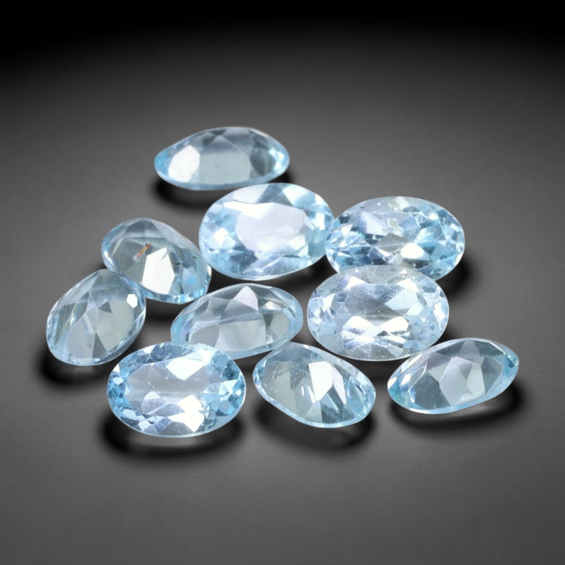 5.26 Carats Natural Brazilian Sky Blue Topaz Oval Faceted Loose Gemstone, 55TS: Constructed from genuine natural topaz sourced from Brazilian mineral deposits, the raw material has been refined through professional faceted lapidary processing with consistent glossy polishing acro
