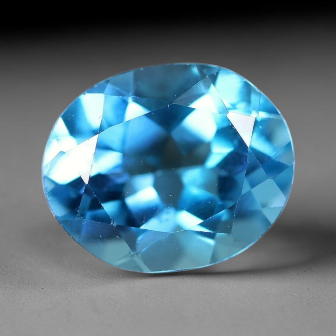 3.94 Carats Natural Swiss Blue Topaz Loose Gemstone, 95WJ: This genuine natural swiss blue topaz displays consistent saturated blue coloration inherent to unprocessed natural mineral specimens. Formed through natural geological formation, the stone carries su