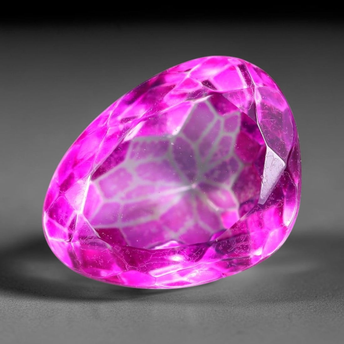 5.80 Carats Natural Brazilian Pink Topaz Pear Faceted Loose Gemstone, 8TM: This specimen is composed of natural topaz sourced from Brazilian mineral deposits, processed via professional faceted lapidary techniques with consistent glossy polishing applied to the entire crysta