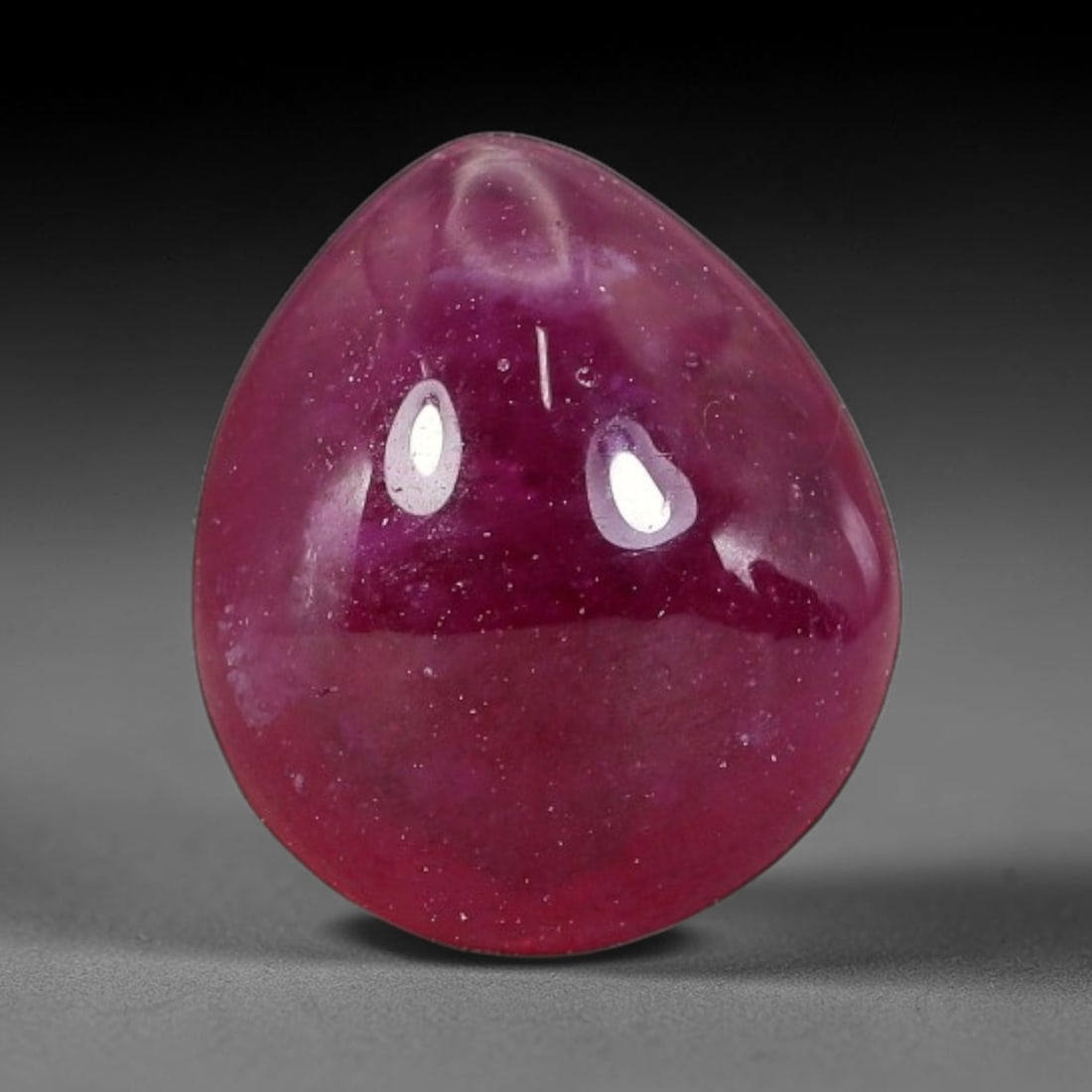 4.23 Carats Natural Mozambique Ruby Cabochon Loose Gemstone, 47TM: This ruby originates from Mozambique natural mineral deposits and receives professional cabochon grinding and polishing treatment to form a smooth glossy exterior surface. Tiny mineral particles and n