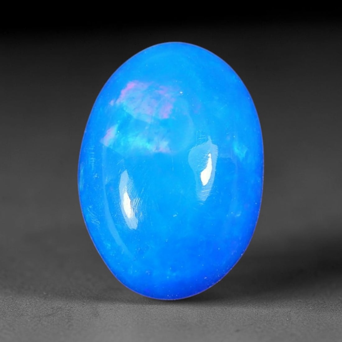 3.50ct Natural Ethiopian Welo Blue Fire Opal Cabochon Loose Gemstone, 90TH: This opal is sourced from Ethiopian Welo natural opal deposits and shaped into a smooth polished cabochon form with refined lapidary finishing work. Bright warm blue base accompanied by vivid internal