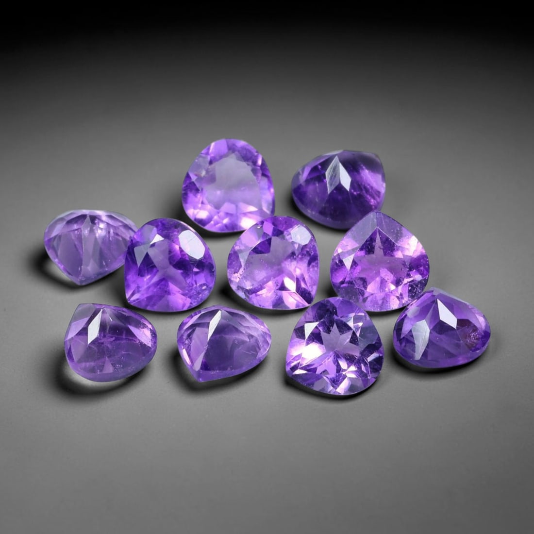 4.35ct Natural Purple Amethyst Trillion Cut Loose Gemstone Parcel, 4TT: This parcel trillion faceted natural amethyst gemstones with aggregate total weight of 4.35 carats, each stone measuring 5.1x5.0x3.4mm. The gems display vibrant rich purple colouration with subtle nat