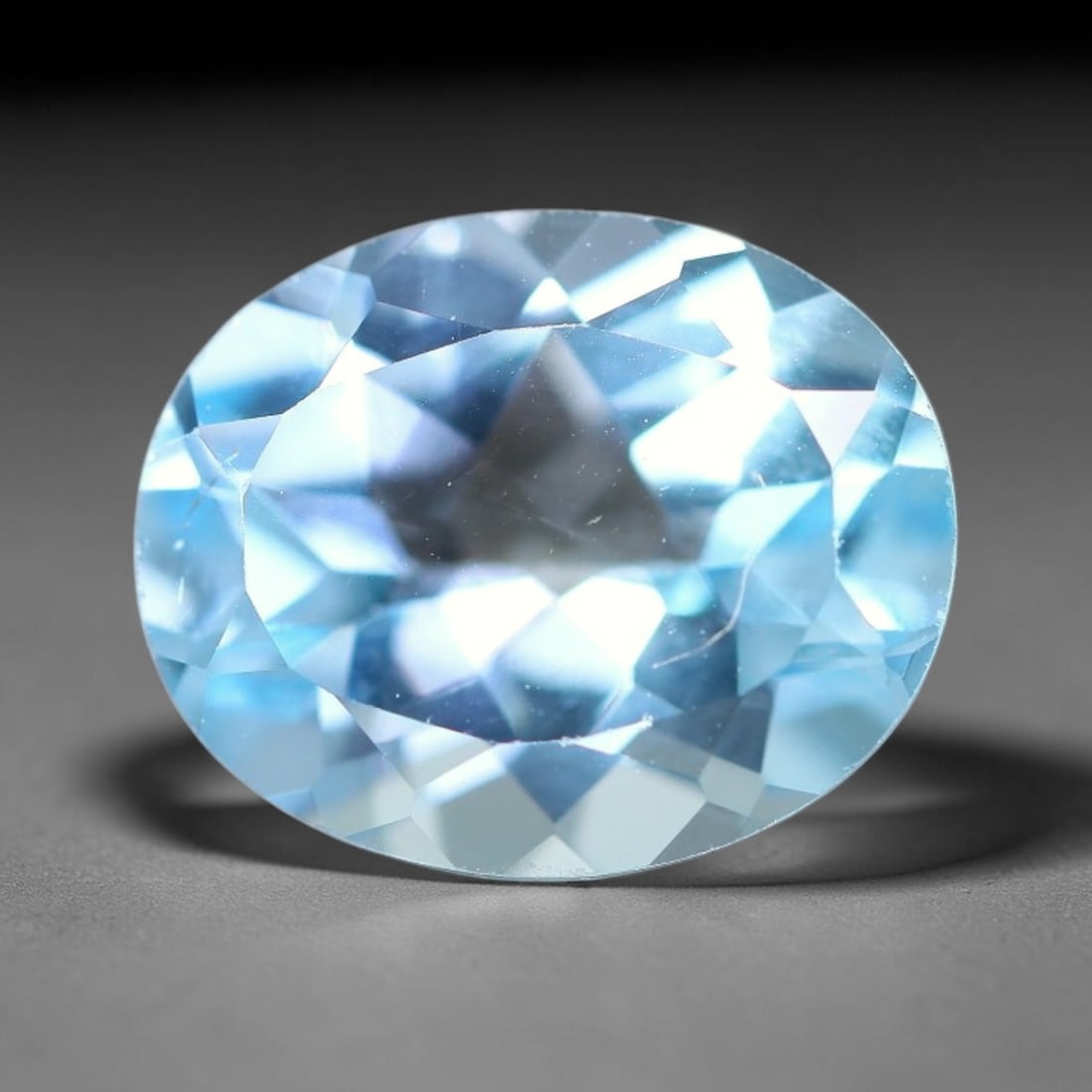 4.15 Carats Natural Brazilian Sky Blue Topaz Oval Faceted Loose Gemstone, 58TS: Constructed from genuine natural topaz sourced from Brazilian mineral deposits, the raw material has been refined through professional faceted lapidary processing with consistent glossy polishing acro