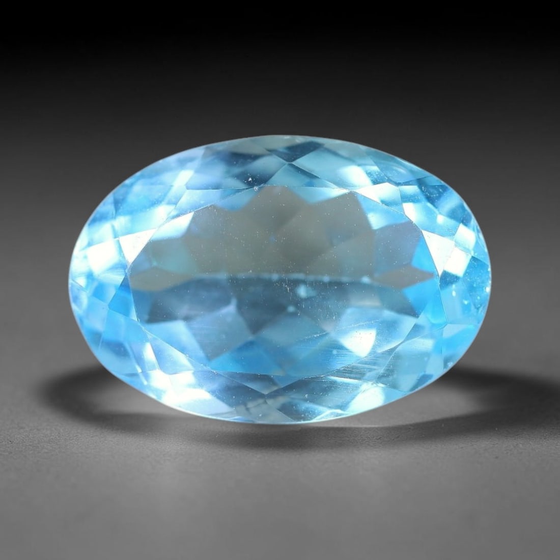 11.70 Carats Natural Brazilian Sky Blue Topaz Oval Faceted Loose Gemstone, 29YW: Constructed from genuine natural topaz sourced from Brazilian mineral deposits, the raw material has been refined through professional faceted lapidary processing with consistent glossy polishing acro