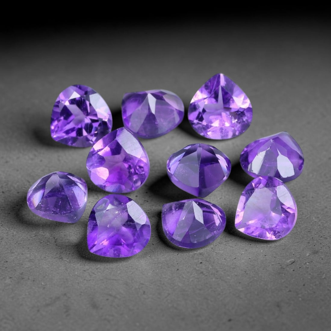 4.36ct Natural Purple Amethyst Trillion Cut Loose Gemstone Parcel, 3TT: This parcel trillion faceted natural amethyst gemstones with aggregate total weight of 4.36 carats, each stone measuring 5.1x3.1mm. The gems exhibit vivid saturated purple colouration with subtle natu
