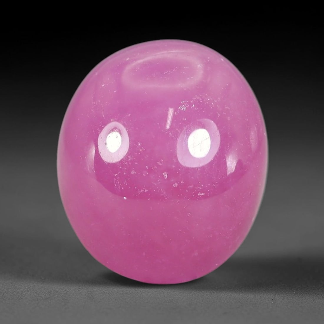 15.00 Carats Natural Mozambique Ruby Cabochon Loose Gemstone, 48TM: This ruby originates from Mozambique natural mineral deposits and receives professional cabochon grinding and polishing treatment to form a smooth glossy exterior surface. Tiny mineral particles and n