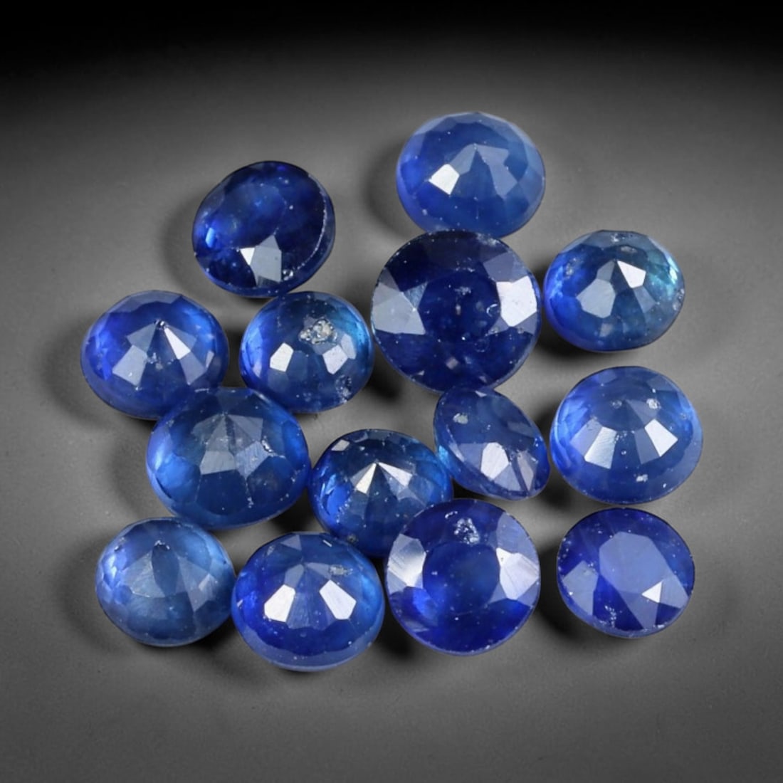 3.36ct Natural Blue Sapphire Round Cut Loose Gemstone 14pcs Parcel, 92YW: This parcel contains fourteen round faceted natural blue sapphires with total aggregate weight of 3.36 carats, each stone measuring 3.8x3.5mm. The gemstones exhibit rich deep blue colouration with nat