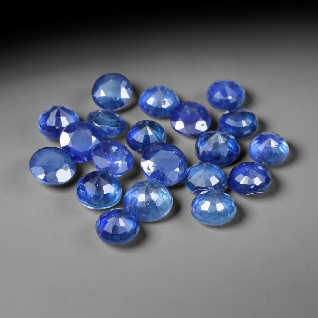 4.47ct Natural Blue Sapphire Round Cut Loose Gemstone Parcel, 12TZ: This parcel round faceted natural blue sapphires with each stone measuring 3.7x1.8mm. The gemstones show saturated deep blue colouration with natural mineral inclusions and subtle internal growth feat