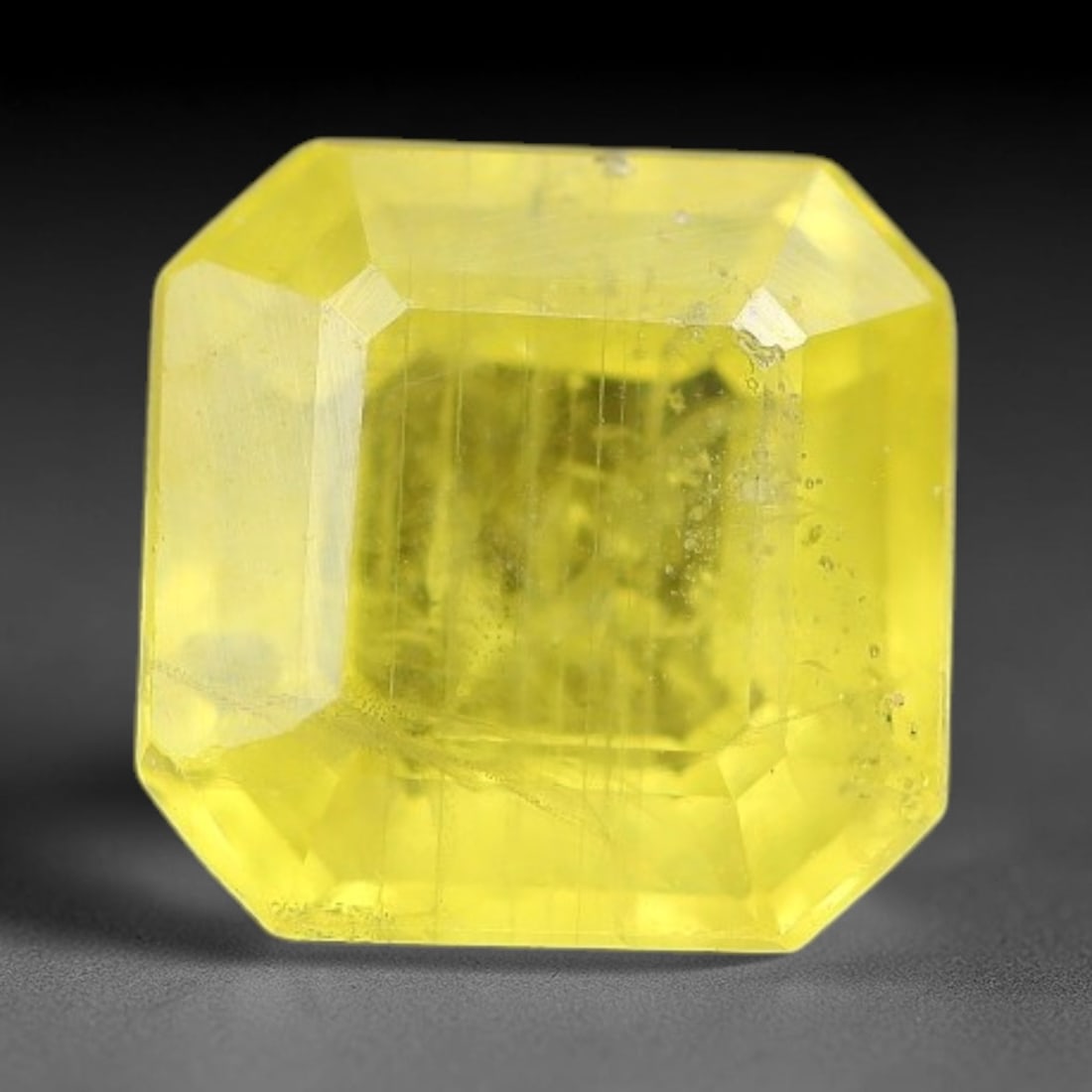 1.00 Carats Natural Yellow Sapphire Square Faceted Loose Gemstone, 43TT: This natural yellow sapphire features a classic square brilliant faceted cut, holding consistent warm golden-yellow color throughout the corundum crystal. Fine microscopic mineral specks and faint nat