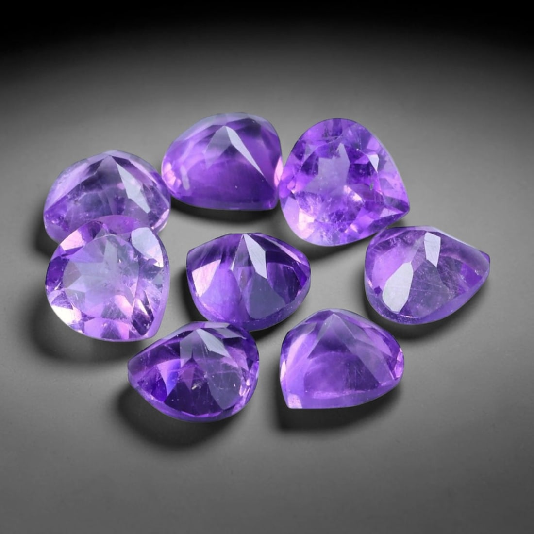 3.51ct Natural Purple Amethyst Trillion Cut Loose Gemstone Parcel, 6TT: This parcel trillion faceted natural amethyst gemstones with aggregate total weight of 3.51 carats, each stone measuring 5.0x4.9x3.3mm. The gems display vibrant rich purple colouration with subtle nat