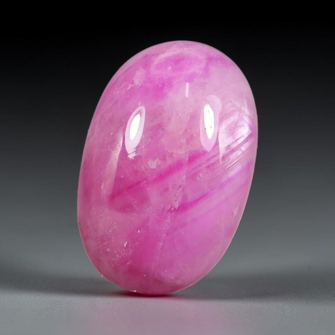 12.14 Carats Natural Mozambique Ruby Cabochon Loose Gemstone, 59TM: This ruby originates from Mozambique natural mineral deposits and receives professional cabochon grinding and polishing treatment to form a smooth glossy exterior surface. Tiny mineral particles and n