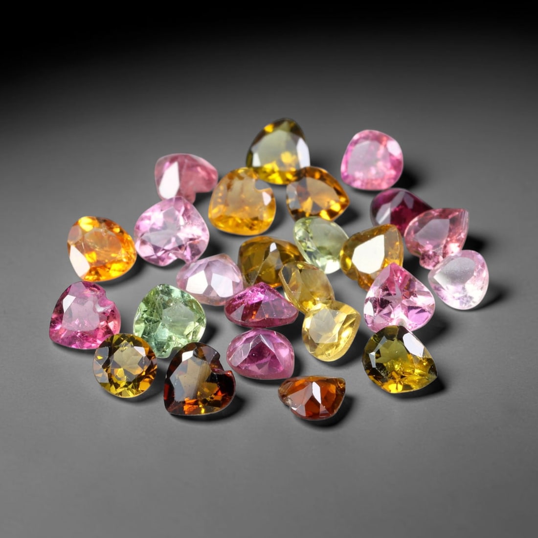 3.40ct Natural Multi Color Tourmaline Heart Cut Loose Gemstone 25pcs Parcel, 25TZ: This parcel contains 25pcs heart faceted natural tourmalines with total aggregate weight of 3.40 carats, each stone measuring 3.8x3.6x2.1mm. The gemstones display a varied palette of pink, green, yell