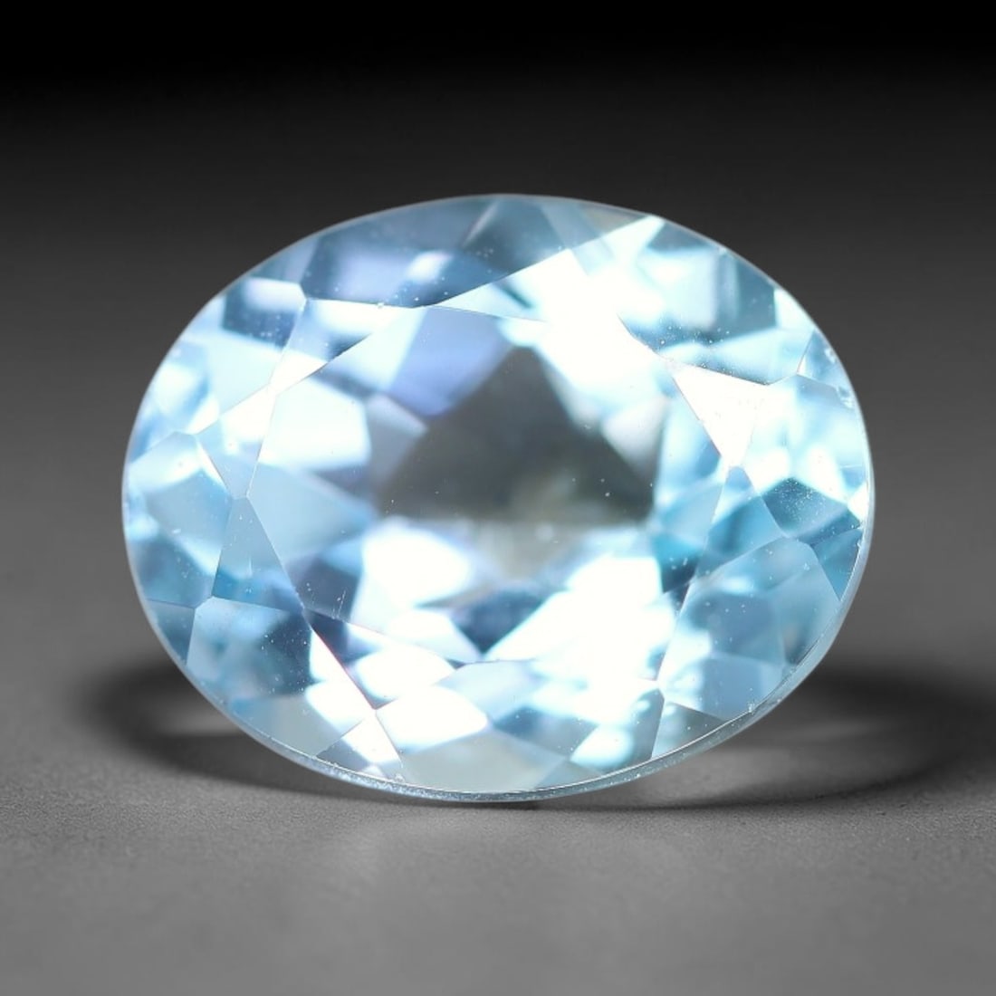 4.66 Carats Natural Brazilian Sky Blue Topaz Oval Faceted Loose Gemstone, 59TS: Constructed from genuine natural topaz sourced from Brazilian mineral deposits, the raw material has been refined through professional faceted lapidary processing with consistent glossy polishing acro
