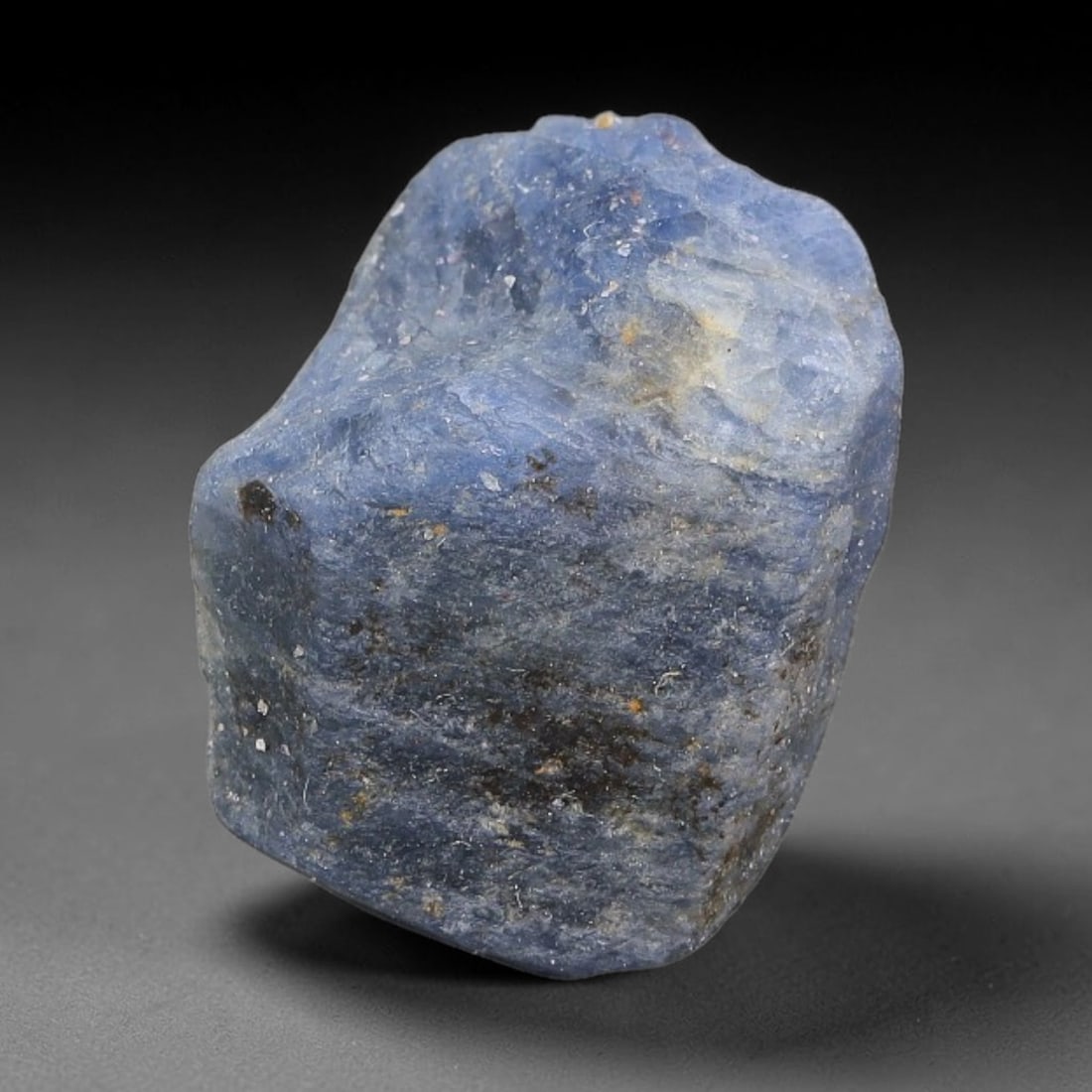 33.94ct Natural Blue Spinel Rough Gemstone, Raw Spinel Crystal, 11TV: Natural blue spinel rough crystal weighing 33.94 carats, dimensions 18.1x13.7x12.8mm. Unpolished raw specimen with deep blue tones mixed with natural mineral flecks and surface matrix. Retains origina