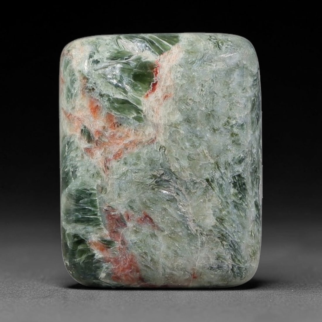 12.01 Carats Natural Deep Green Siberian Seraphinite Polished Cabochon, 72TZ: This is a fully natural polished seraphinite specimen sourced from Siberian deposits, displaying distinct feathery fibrous inclusions that create beautiful flowing chatoyant patterns across its smooth