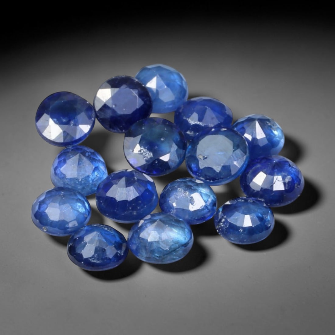 3.33ct Natural Blue Sapphire Round Cut Loose Gemstone Parcel, 9TZ: This parcel round faceted natural blue sapphires with each stone measuring 3.5x2.4mm. The gemstones show saturated deep blue colouration with natural mineral inclusions and subtle internal growth feat