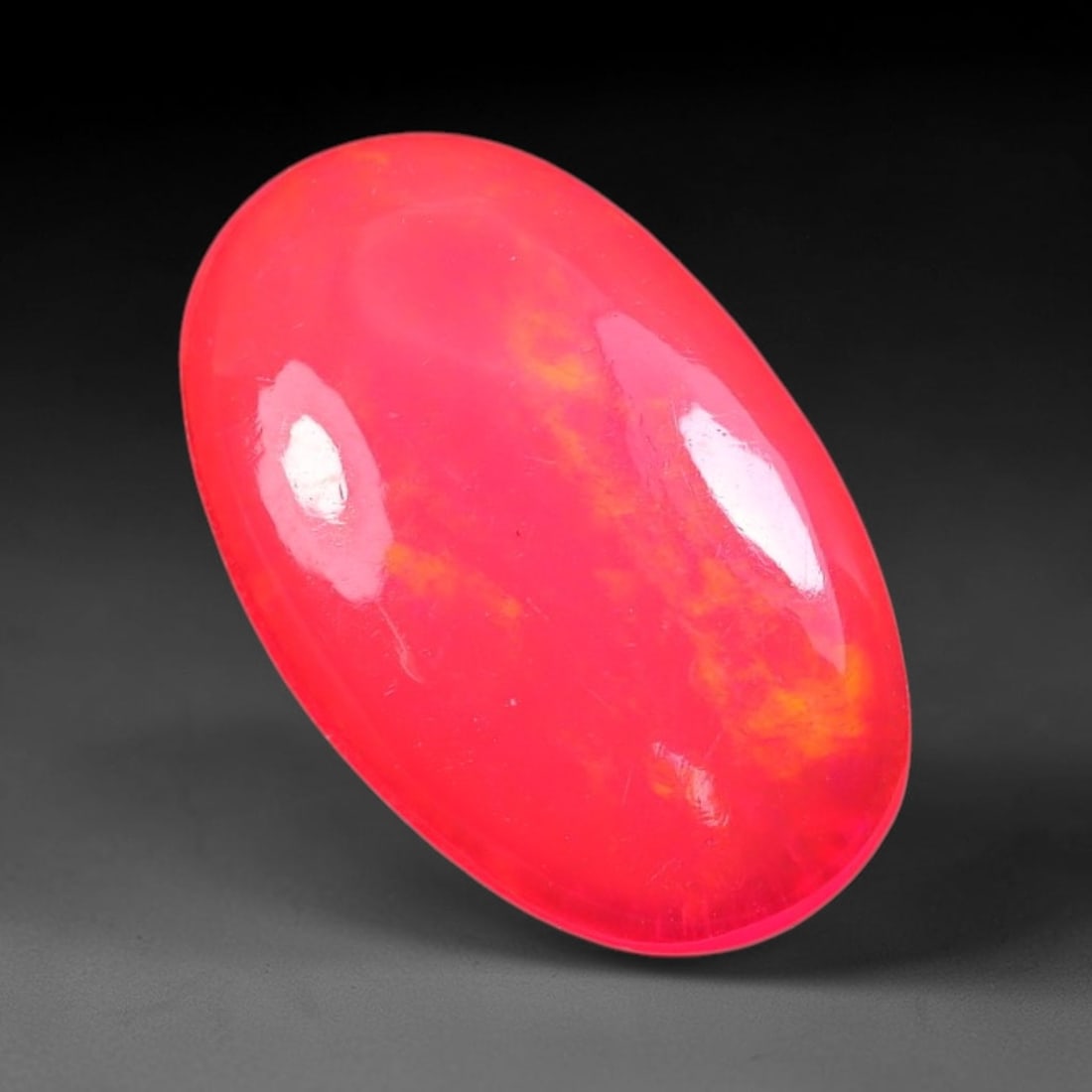 1.87ct Natural Ethiopian Welo Pink Fire Opal Cabochon Loose Gemstone, 95TS: This opal is sourced from Ethiopian Welo natural opal deposits and shaped into a smooth polished cabochon form with refined lapidary finishing work. Bright warm pink base accompanied by vivid internal