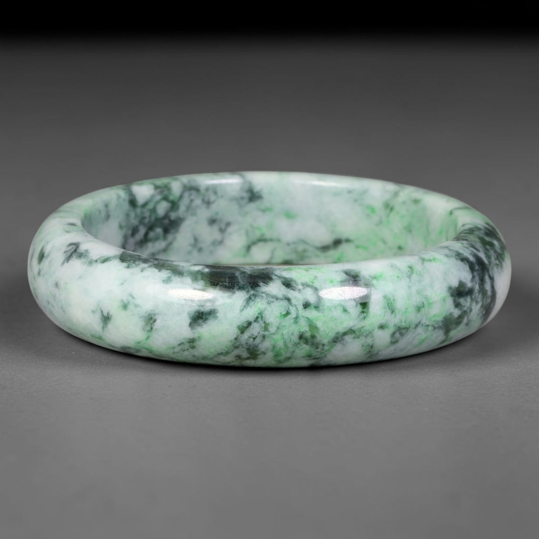 Natural Burmese Type A Variegated Moss Floating Green Jadeite Jade Bangle Bracelet, 58TD: Highly polished jadeite bangle with a creamy pale white base swirled with dramatic variegated moss and floating deep green cloud patterns. Inner dimension 56.2x14.6mm, solid rounded band with smooth g