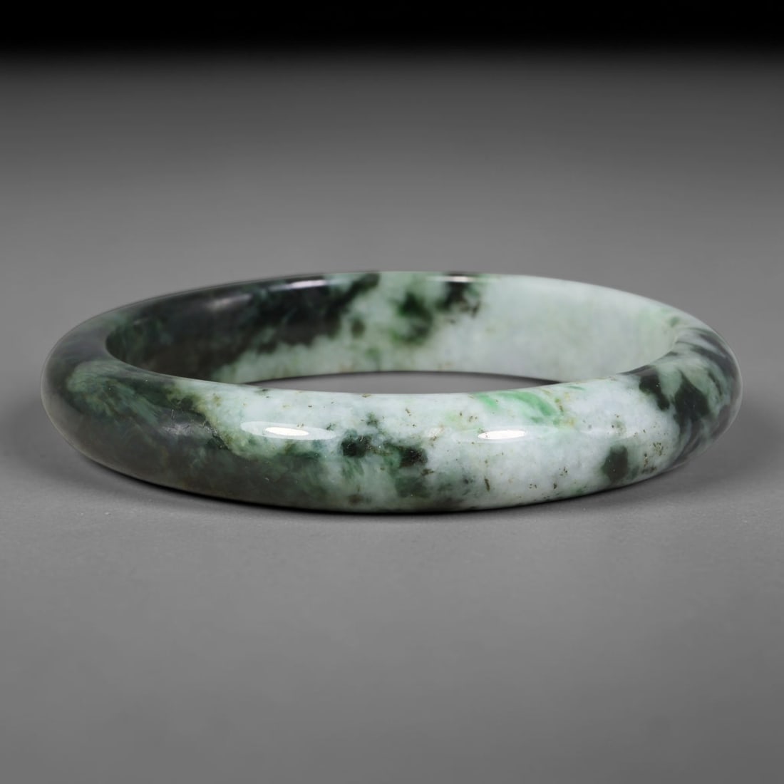 Natural Burmese Type A Dark Moss Floating Green Jadeite Jade Bangle Bracelet, 4TJ: Polished jadeite bangle with creamy white base layered with dramatic dark moss green floating patches. Inner dimension 59.8x11.6mm, smooth rounded band with glossy finish. Bold contrasting natural gre