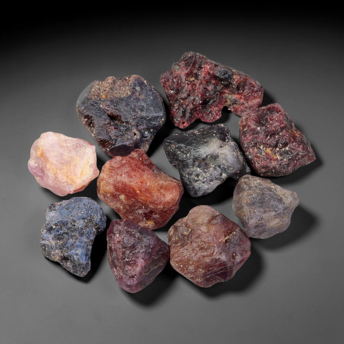 207.67ct Natural Spinel Rough Gemstone Parcel, Raw Spinel Crystals, 36TV: Natural spinel rough parcel with largest specimen measuring 22.8x16.8x10.6mm. Raw unpolished spinel crystals showing varied tones of red, pink, purple and grey, featuring natural crystalline textures,