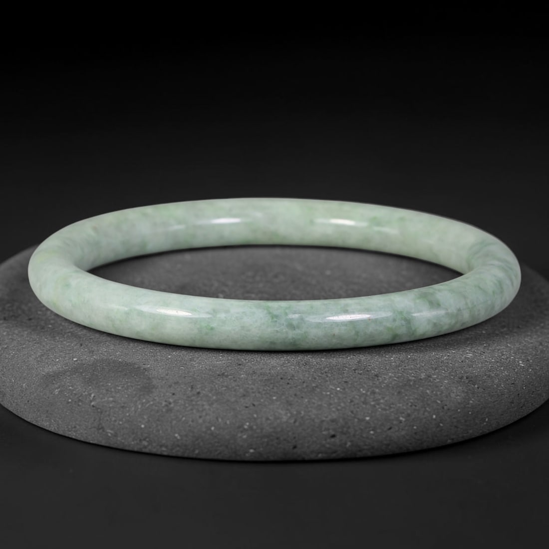 Natural Burmese Type A Pale Floating Green Jadeite Jade Slim Bangle Bracelet, 86TD: Delicately polished slim jadeite bangle in soft pale celadon tone with faint floating green wisps throughout the stone. Inner dimension 63.2x7.8mm, thin rounded band with gentle natural gloss. Subtle 