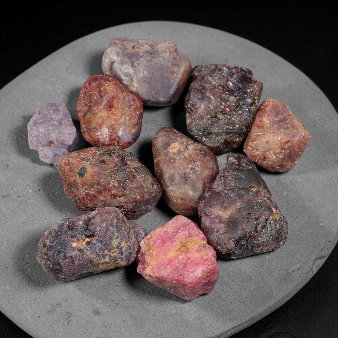 200.86ct Natural Spinel Rough Gemstone Parcel, Raw Spinel Crystals, 54TV: Natural spinel rough parcel with largest specimen measuring 22.2x16.7x10.0mm. Raw unpolished spinel crystals showing varied tones of red, pink, purple and grey, featuring natural crystalline textures,