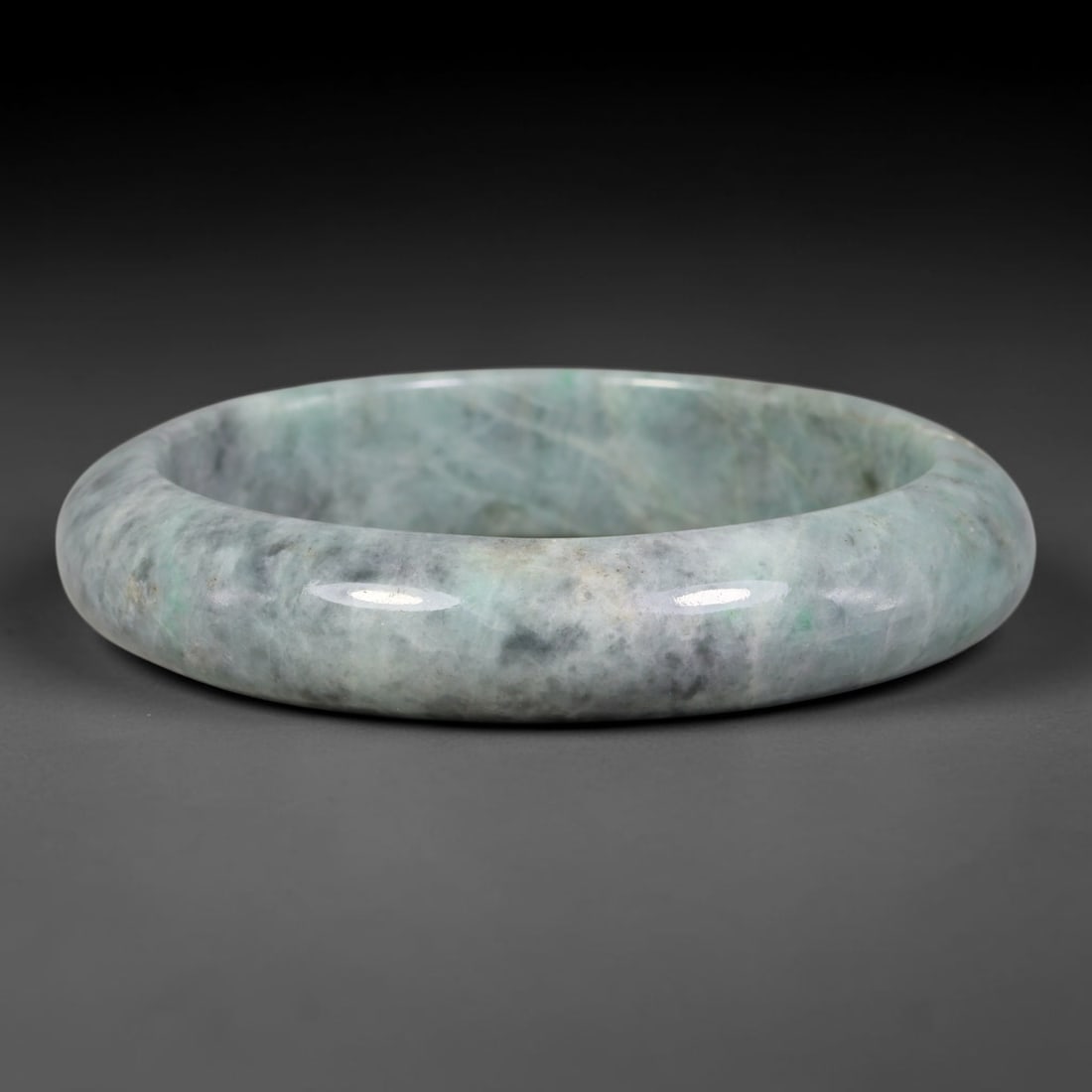 Natural Burmese Type A Grey Cloud Floating Green Jadeite Jade Bangle Bracelet, 5TJ: Solid polished jadeite bangle with soft celadon base blended with misty grey cloud mottling and subtle floating green accents. Inner dimension 58x13.6mm, thick rounded band with smooth glossy finish. 
