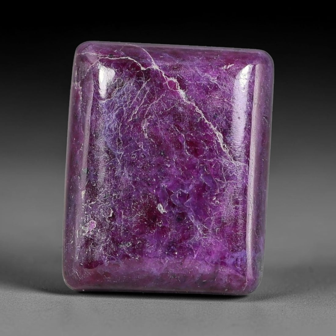 16.88ct Natural Ruby Zoisite Cabochon Loose Gemstone, 97TZ: Natural ruby zoisite cabochon cut, dimensions 15.9x13.0x5.2mm. Rich magenta and deep purple swirling colour pattern with natural mineral veining across the polished surface. Smooth polished cabochon f