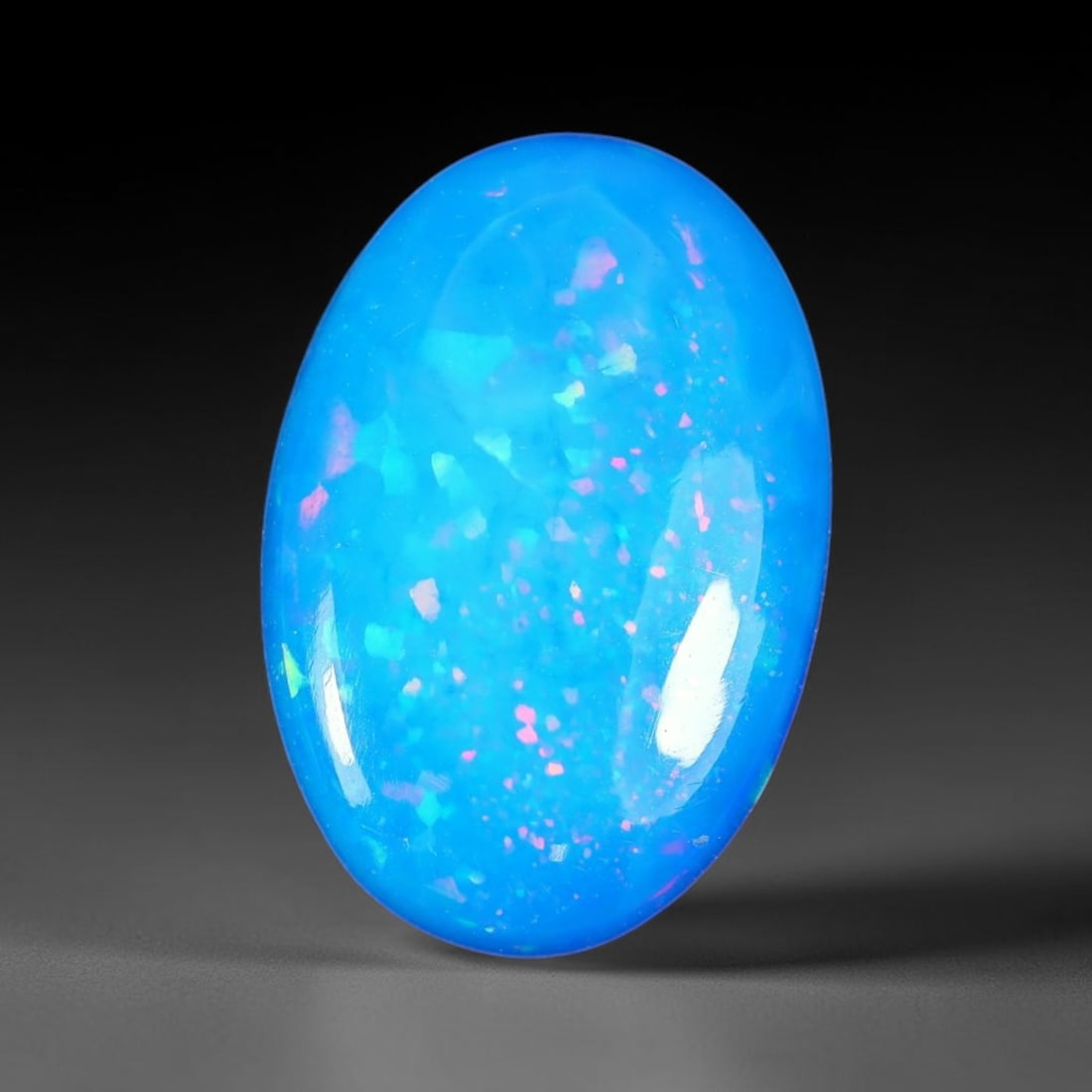 3.28ct Natural Ethiopian Welo Blue Fire Opal Cabochon Loose Gemstone, 81TS: This opal is sourced from Ethiopian Welo natural opal deposits and shaped into a smooth polished cabochon form with refined lapidary finishing work. Bright warm blue base accompanied by vivid internal