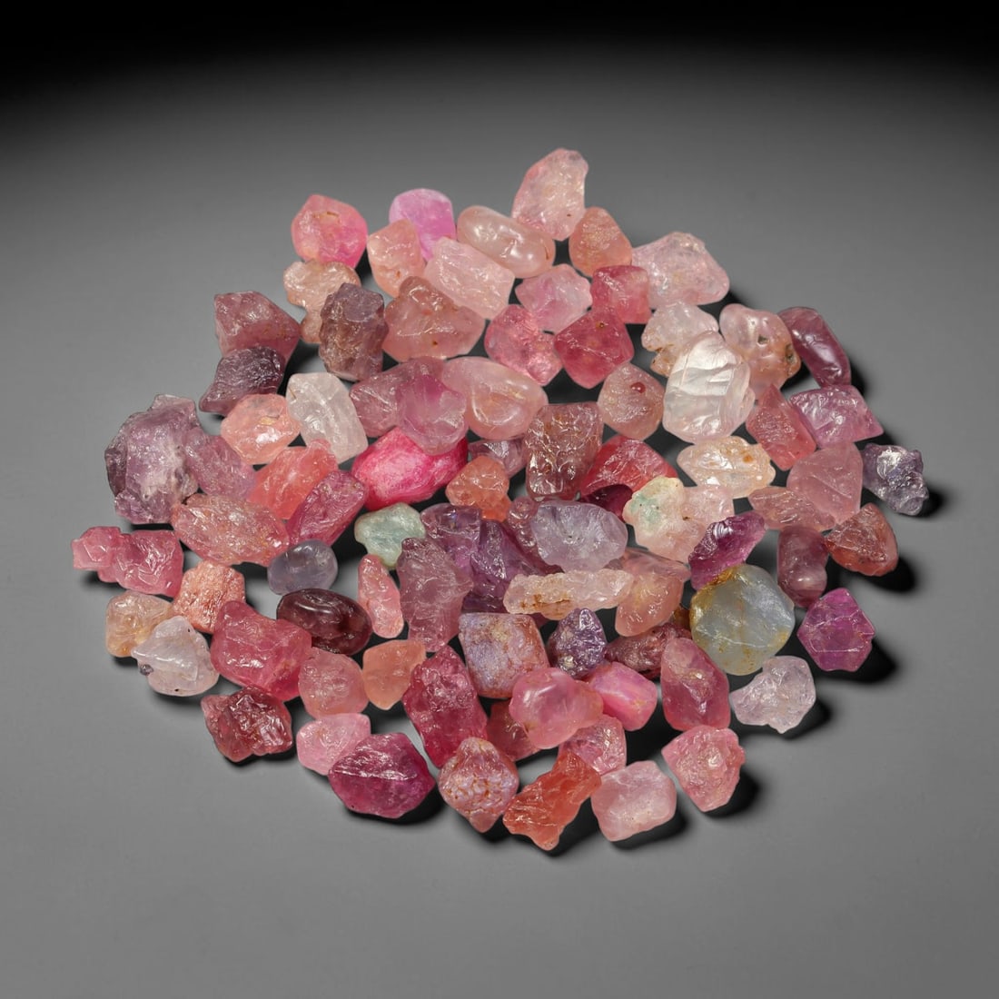 121.22ct Natural Multi-Colour Spinel Rough Parcel Loose Gemstone, 81TV: Natural spinel rough parcel showcasing a beautiful array of soft varied hues with subtle tonal differences throughout each crystal. Raw crystalline surfaces carry authentic natural mineral textures an