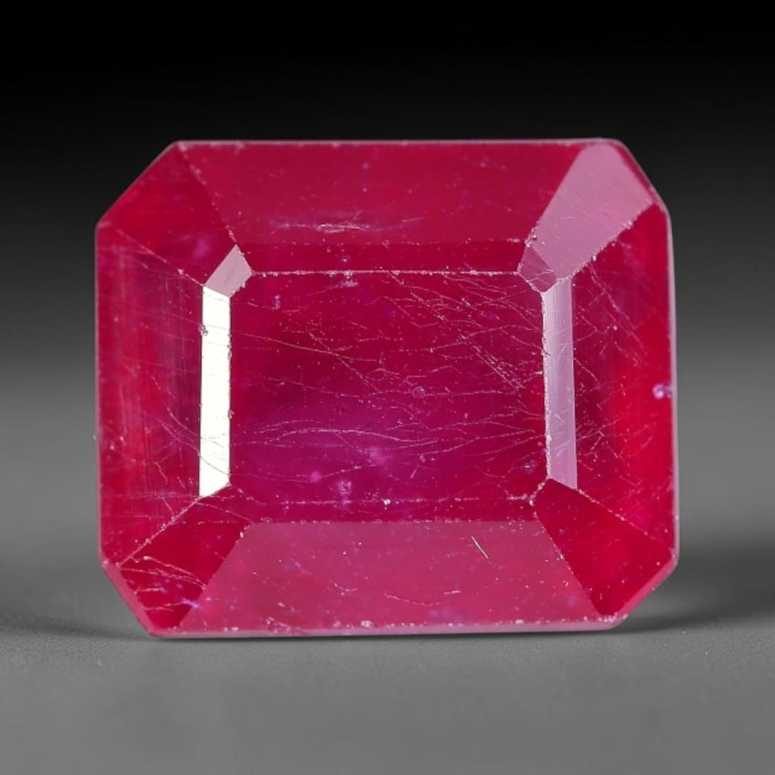 7.33 Carats Natural Madagascar Ruby Octagon Cut Loose Gemstone, 83TY: This natural Madagascar ruby is crafted into a octagon modified step cut, displaying vivid saturated crimson red color typical of Malagasy corundum. Fine scattered mineral inclusions, subtle internal 