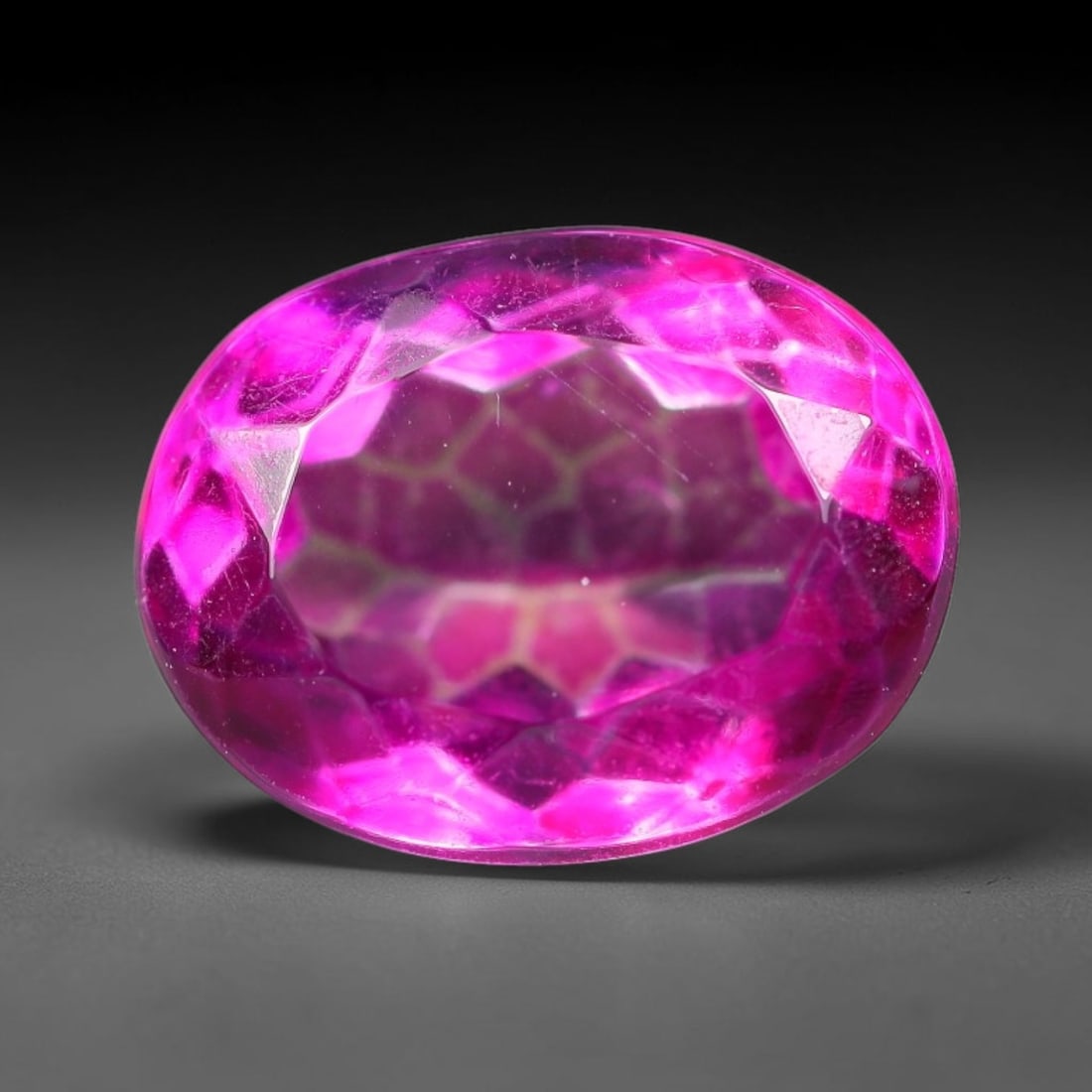 4.91 Carats Natural Brazilian Pink Topaz Oval Faceted Loose Gemstone, 97SA: This specimen is composed of natural topaz sourced from Brazilian mineral deposits, processed via professional faceted lapidary techniques with consistent glossy polishing applied to the entire crysta