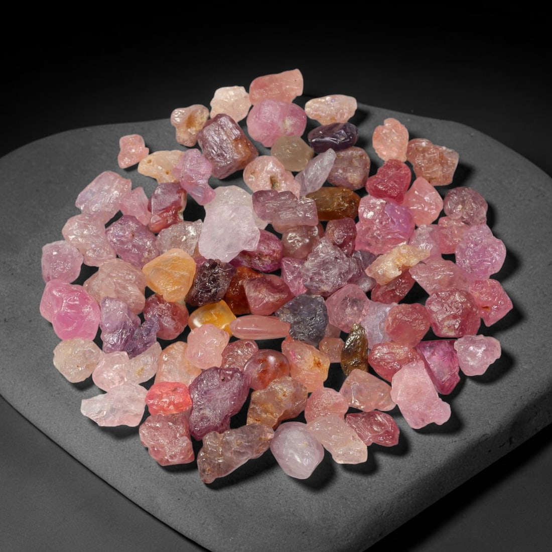 118.25ct Natural Multi-Colour Spinel Rough Parcel Loose Gemstone, 82TV: Natural spinel rough parcel showcasing a beautiful array of soft varied hues with subtle tonal differences throughout each crystal. Raw crystalline surfaces carry authentic natural mineral textures an