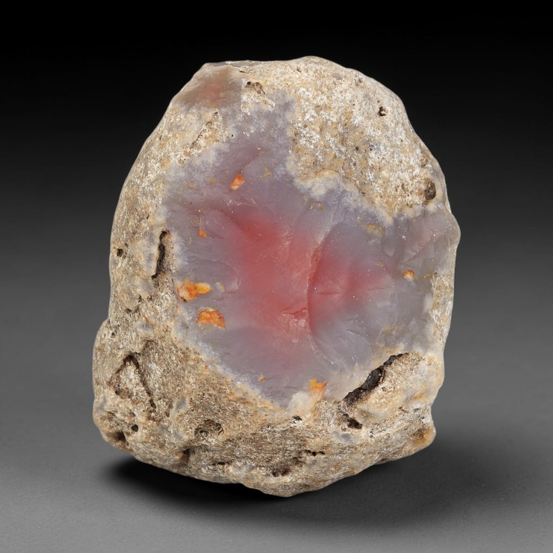 319g Natural Pink Center Agate Rough Specimen, Raw Agate, 5SB: Natural agate rough weighing 319 grams, measuring 78.3x59.6x58.7mm. This raw agate features a striking translucent pink core surrounded by pale grey chalcedony, encased in weathered rocky rind with sm