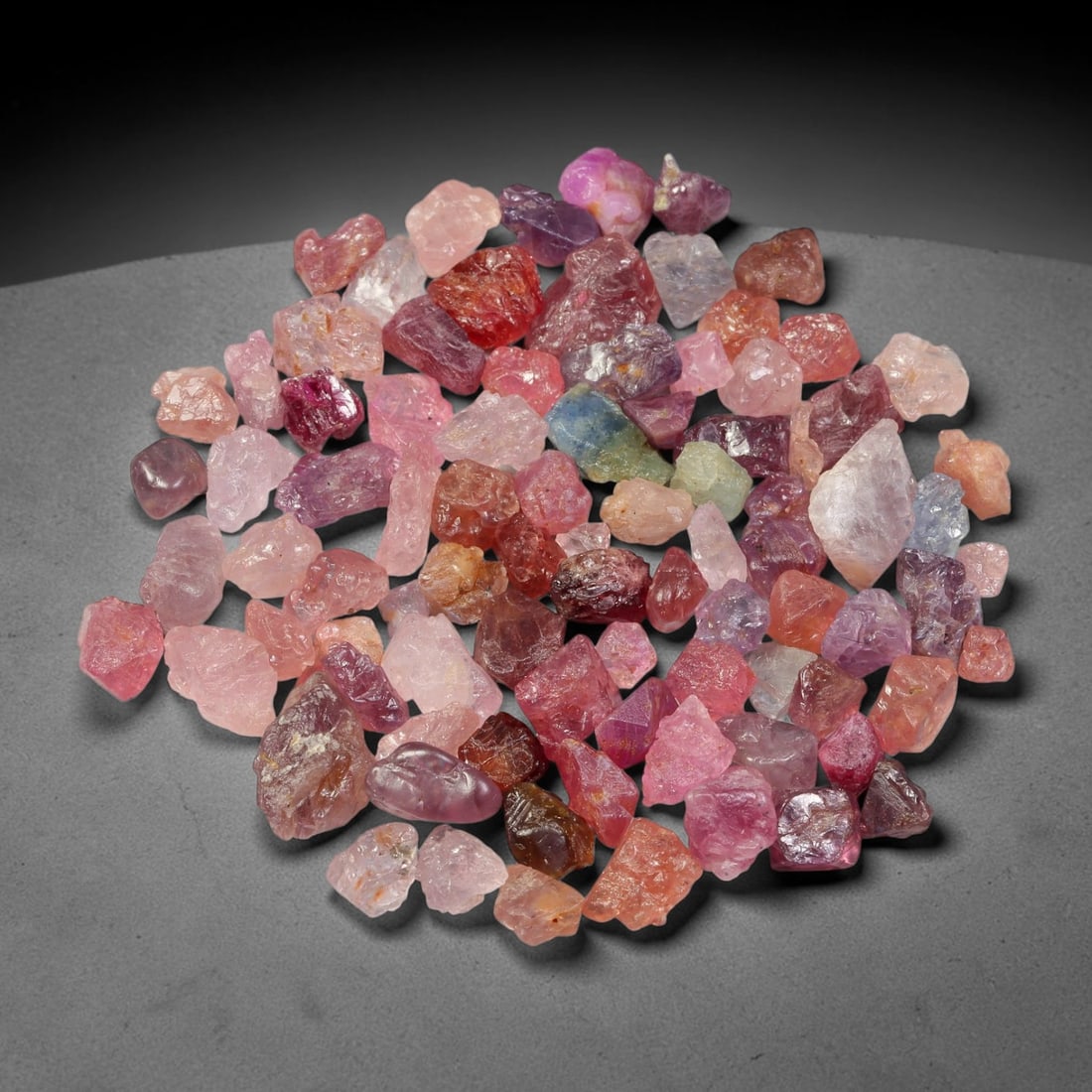 126.26ct Natural Multi-Colour Spinel Rough Parcel Loose Gemstone, 80TV: Natural spinel rough parcel showcasing a beautiful array of soft varied hues with subtle tonal differences throughout each crystal. Raw crystalline surfaces carry authentic natural mineral textures an