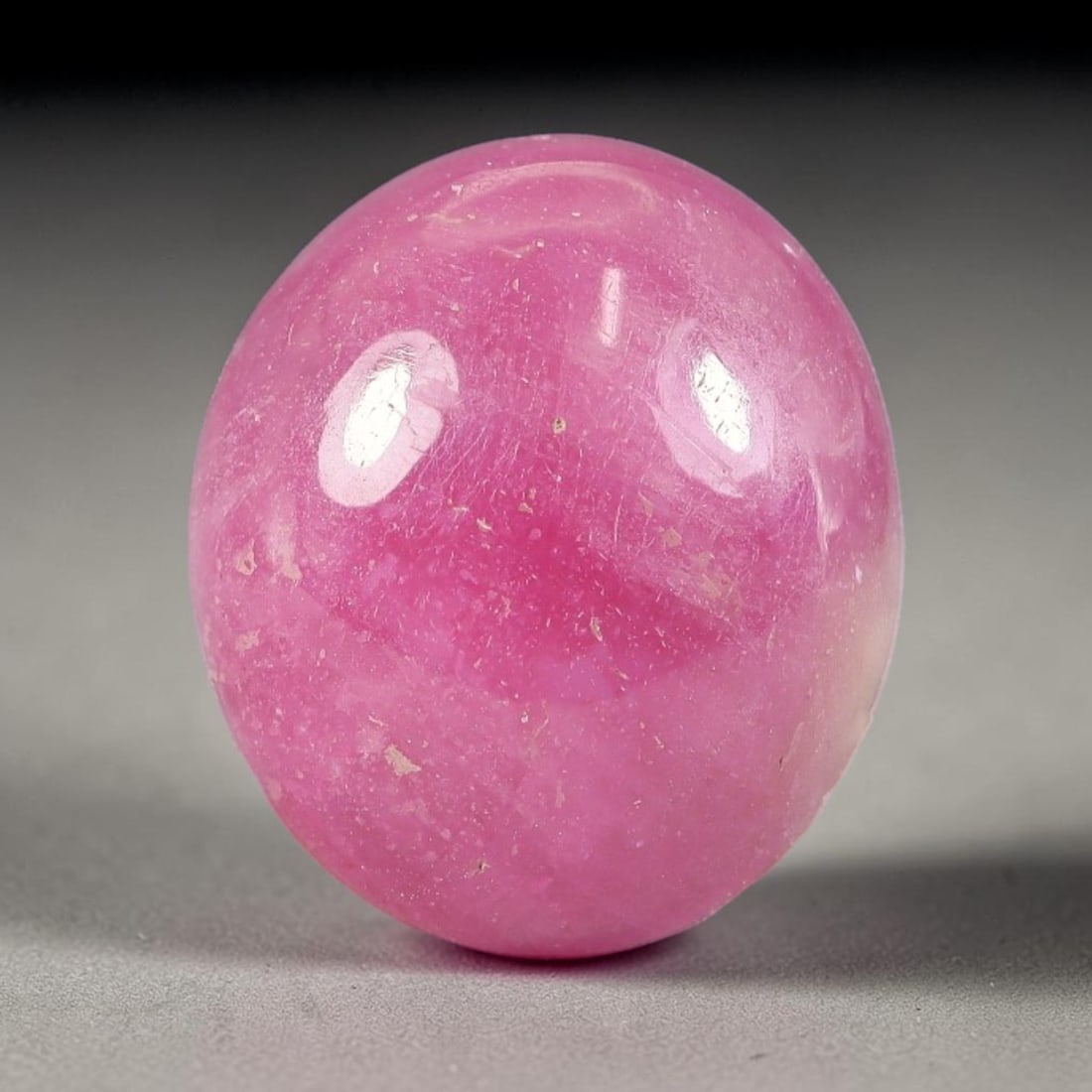 10.56Carats Natural Mozambique Ruby Cabochon Loose Gemstone, 36SA: This ruby originates from Mozambique natural mineral deposits and receives professional cabochon grinding and polishing treatment to form a smooth glossy exterior surface. Tiny mineral particles and n