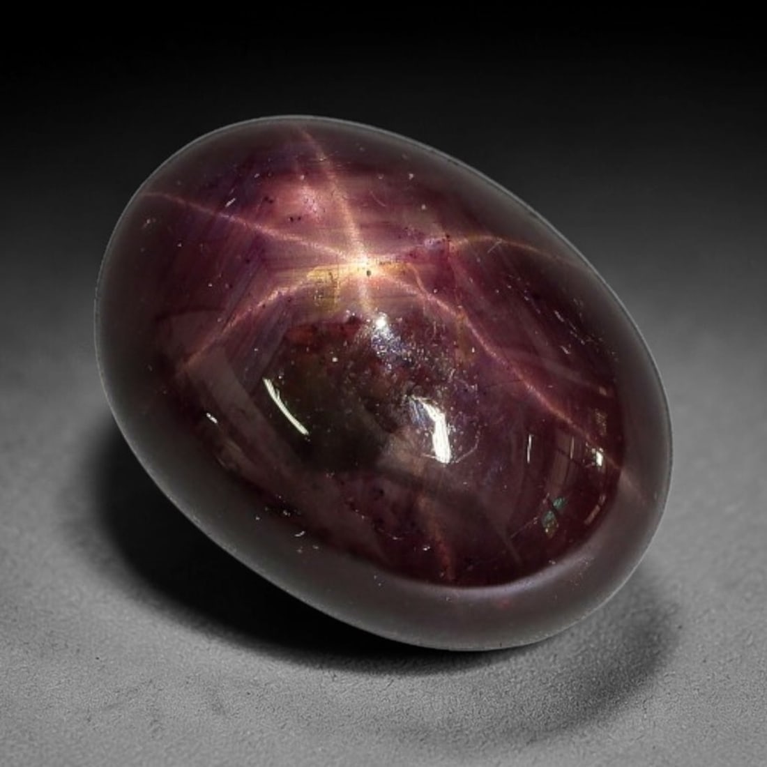 18.48ct Natural 6 Rays Star Ruby Oval Cabochon Loose Gemstone, 87TY: Natural six-ray star ruby oval cabochon loose gemstone, measuring 16.6x12.3x8.0mm. Smooth polished cabochon surface with sharp star asterism that appears under direct light. Perfect for custom pendant