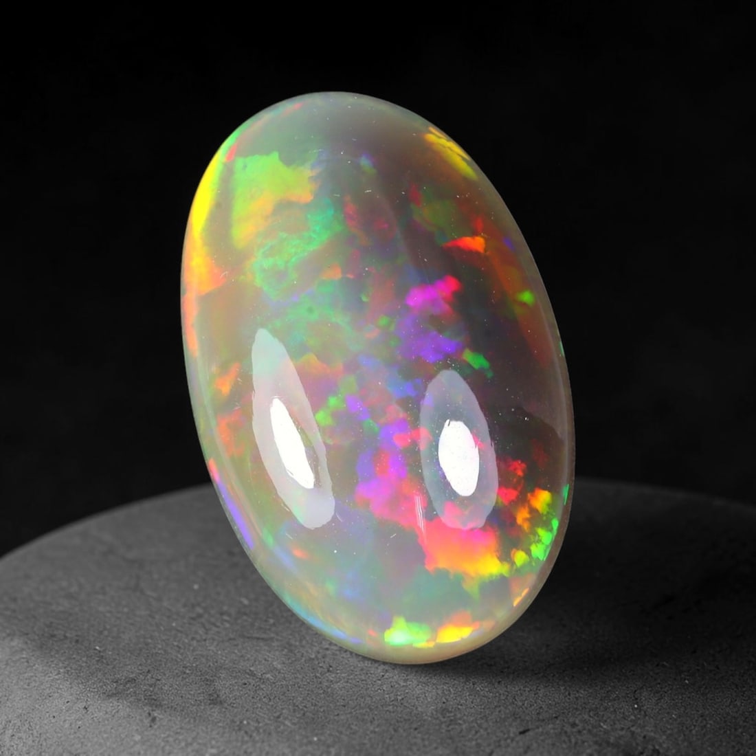 28.69ct Natural Multicolor Fire Ethiopian Welo Solid Opal Cabochon, 61TY: Formed from natural silica deposits within Ethiopian mineral veins, this solid opal cabochon features a smooth polished domed surface that highlights its natural light diffraction properties. Large fl