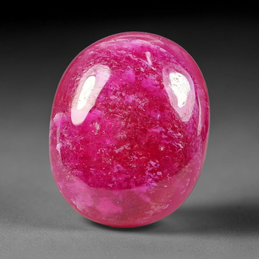 18.76Carats Natural Mozambique Ruby Cabochon Loose Gemstone, 42SA: This ruby originates from Mozambique natural mineral deposits and receives professional cabochon grinding and polishing treatment to form a smooth glossy exterior surface. Tiny mineral particles and n